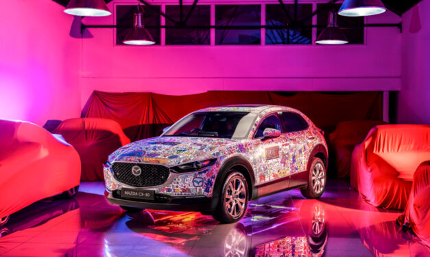 Doodle artist Luke Crump and CarFest attendees create Mazda CX-30 art car