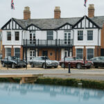 Cars, and stars, turn out for a unique celebration of the 70-year bond between Aston Martin and Newport Pagnell