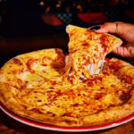 Frankie & Benny’s launches new All-Inclusive feast with 90 minutes of unlimited pizza, pasta, sides and soft drinks for just £19.95